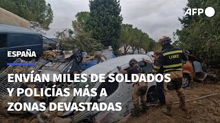 Miles de soldados y policías adicionales llegarán a las zonas devastadas en España  AFP [upl. by Kalb886]