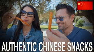 We Try 5 AUTHENTIC Chinese Snacks [upl. by Asreht]