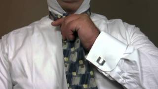 How To Tie a Tie The Onassis [upl. by Anitnamaid]