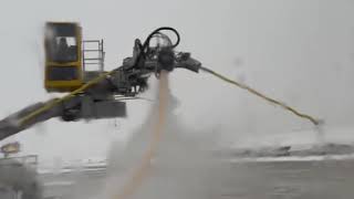 Planes sprayed with antiicing fluid at OHare Airport [upl. by Yeh]