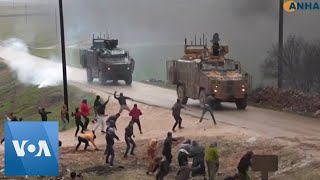 Civilians Throw Rocks at Turkish Military Convoy in Northwestern Syria [upl. by Treharne]