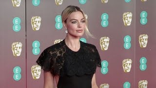 Margot Robbie stuns on the red carpet for the 70th BAFTA in London [upl. by Knorring]