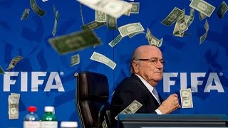 Sepp Blatter showered with banknotes as prankster Lee Nelson storms Fifa press conference [upl. by Seline330]