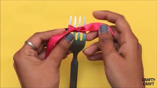 How to make ribbon bow with a fork [upl. by Nauqas786]