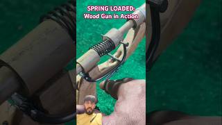 SPRING LOADED Wood Gun in Action satisfying handmade tools survival outdoortools youtubeshort [upl. by Auqinahs]