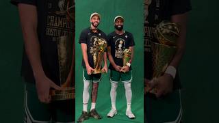 Jason Tatum and Jaylen Brown pose for a picture w the trophy after winning the NBA CHAMPION shorts [upl. by Kremer175]