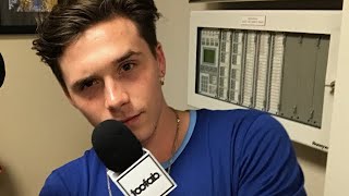 Brooklyn Beckham Talks Photography Tattoos and His Famous Family [upl. by Lekkim]