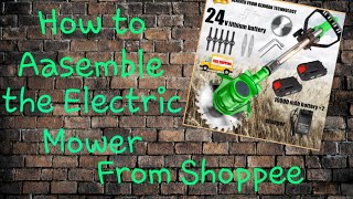 How to assemble the new electric lawn mower grass cutter from shoppee [upl. by Anuaek234]