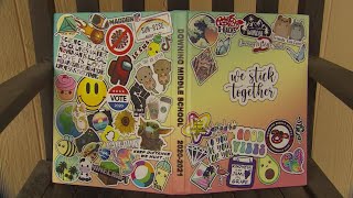 Stickers on Downing Middle School yearbook covers stir controversy in community [upl. by Orling]