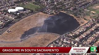 LiveCopter 3 is over a grass fire near Robert D Cochran Park in south Sacramento [upl. by Leiruh]