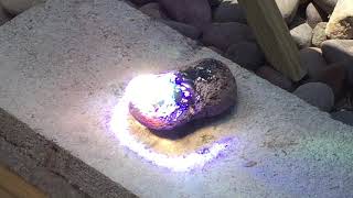 Solar heat ray lens from TV melts rock into lava then glass [upl. by Bein703]