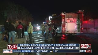 Firemen rescue residents personal items [upl. by Rebme]