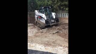 Bobcat T595  Breaking apart compacted soil [upl. by Anivram28]