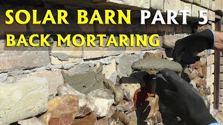 SOLAR BARN Part 5  Back Mortaring on Flint Stone Wall [upl. by Nwadrebma]