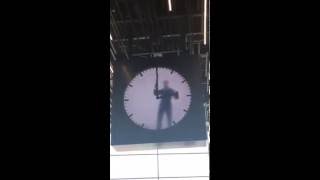 Man in a clock Schipol airport Maarten baas [upl. by Noxas]