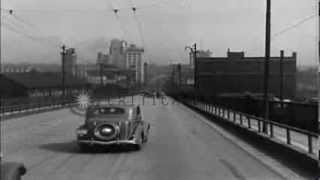 1930s and 1940s automobiles cross Market Street Bridge in Youngstown Ohio UnitedHD Stock Footage [upl. by Kissee467]