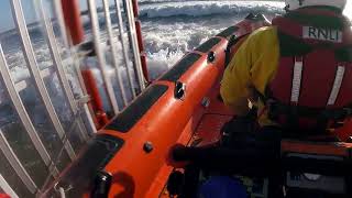 Porthcawl RNLIs Atlantic 85 lifeboat launching through surf at Sandy Bay Coney Beach [upl. by Biggs23]