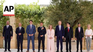 G7 leaders pose for photographers as they prepare to tackle global issues [upl. by Nwahsaj]