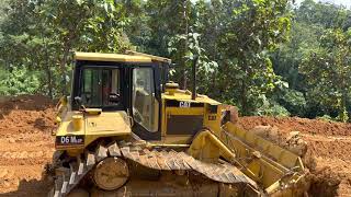 D6M amp D5 Bulldozers working together in a hill area for leveling soil [upl. by Attej274]