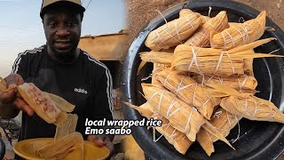 Cooking most Popular and Cheapest snack in Ghana west Africa  OMO SAABO  Local wrapped rice [upl. by Ajnek]