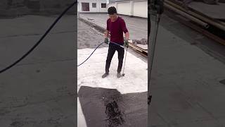 The process of painting a concrete surface with bitumen paint under high pressure [upl. by Plunkett]