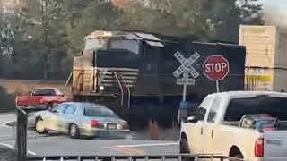 RAW VIDEO Freight train slams into car after stalling on tracks in Georgia [upl. by Noinatrad]