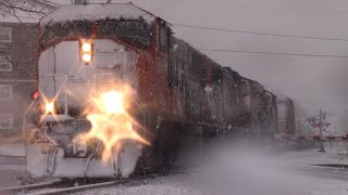 Say it aint Snow Long Manifest Train CN 507 Rolling thru Moncton NB During Spring Snowstorm [upl. by Lasiaf409]