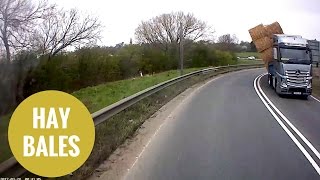 Lorry carrying bales of hay overturned as it took a corner too fast [upl. by Akeme]