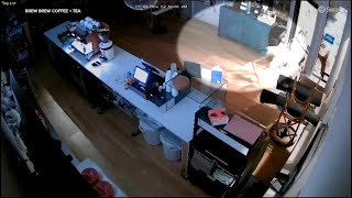 Smashandgrab burglary caught on camera at Chicago coffee shop [upl. by Manlove]