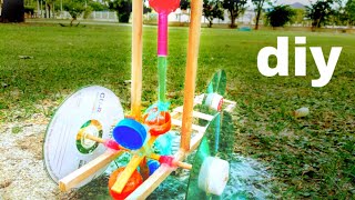 WATER WHEEL Propelled CAR  diy projects [upl. by Acirt]