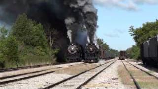 Pere Marquette 1225 and Nickel Plate Road 765 run side by side [upl. by Anilegnave405]