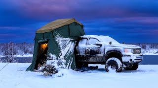 Camping In Snow Storm With Rooftop Tent And Diesel Heater [upl. by Tega688]