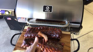 How To Make 411 Baby Back Ribs On The ZGrills 7002C2E PID Controlled Pellet Grill Awesome [upl. by Rednirah]