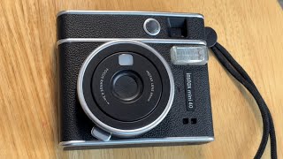 How To Change Batteries in Instax mini 40 camera [upl. by Livy]