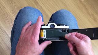 How to load 35mm film into a camera  two minute guide [upl. by Haldis893]