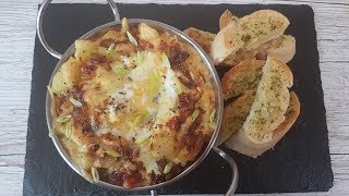 Shakshuka  Eggs in Tomato Sauce Recipe [upl. by Lian]