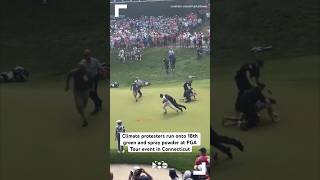 Climate protesters run onto 18th green and spray powder at PGA Tour event in Connecticut [upl. by Eastlake]