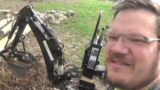 Digging out stumps with a bhm5600 3 point backhoe and Kubota tractor b3201 how to review [upl. by Adi939]