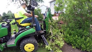 Compact Tractor Backhoe Goes Stump Wrestling and Bush Whacking 2 Projects [upl. by Esinwahs]