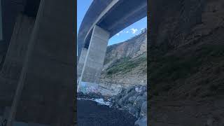 Tucked in under the magnificent structure of the Sea Cliff Bridge seacliff bridges ocean [upl. by Ahtnammas]