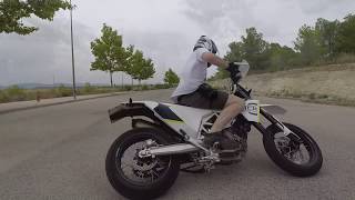 Husqvarna 701 Supermoto Akrapovic sound amp fly by [upl. by Atteoj288]