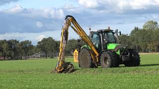 KLEPELEN VAN SLOOTKANTEN MET EEN DEUTZ FAHR AGROTRON M 610 MET EEN HERDER GRENADIER [upl. by Partridge108]