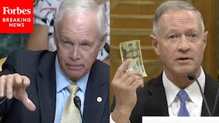 Martin OMalley Pulls Out A 20 Bill To Refute Ron Johnson On Social Security [upl. by Andrej785]