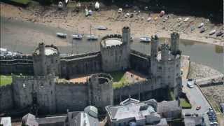 Caernarfon Castle Wales  Visit Britain  Unravel Travel TV [upl. by Nrehtac]