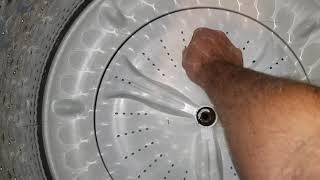 Removing a washing machine wash plate the easy way DIY that anyone can do Maytag Bravos Agitator [upl. by Ellimac]