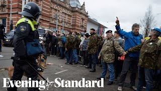 Europe Protests Thousands clash with police in Amsterdam over lockdown measures [upl. by Daub733]