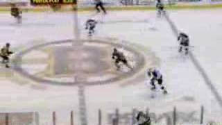 Patrice Bergeron hits Johnny Oduya 121406 [upl. by Lleze254]