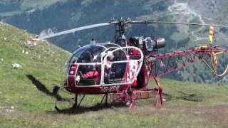 Air Zermatt helicopter quotLamaquot taking off in the mountains  takeoff [upl. by Samuella]