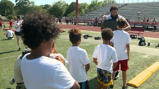 Mass NFL star hosts free football camp for kids [upl. by Ahsitaf533]