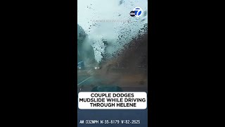 Couple dodges mudslide while driving through Helene [upl. by Hploda]